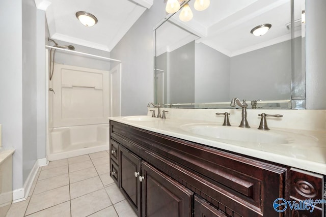 bathroom featuring a sink, crown molding, a shower, and tile patterned floors