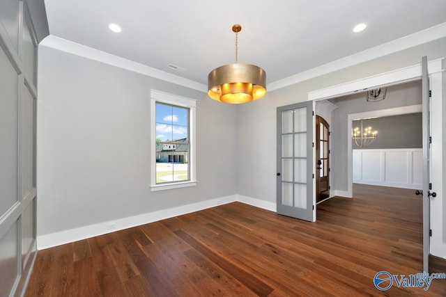 22938 Gunner Cir, Athens, AL 35613 - empty room with a chandelier, wood finished floors, french doors, ornamental molding, and recessed lighting
