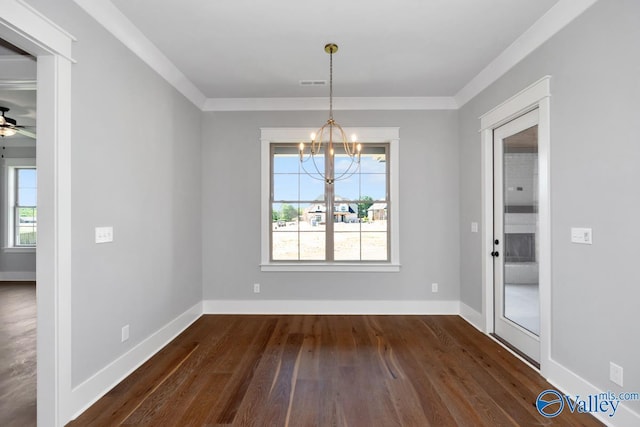 22938 Gunner Cir, Athens, AL 35613 - unfurnished dining area with dark wood finished floors, a chandelier, baseboards, crown molding, and a ceiling fan