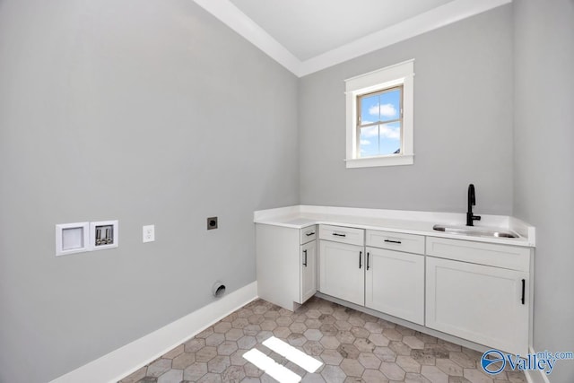 22938 Gunner Cir, Athens, AL 35613 - washroom with electric dryer hookup, hookup for a washing machine, cabinet space, baseboards, and light tile patterned floors