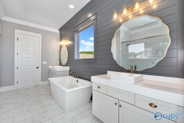 22938 Gunner Cir, Athens, AL 35613 - bathroom with marble finish flooring, wooden walls, two vanities, a freestanding tub, and a stall shower
