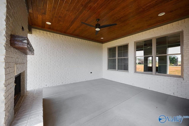 22938 Gunner Cir, Athens, AL 35613 - view of patio / terrace featuring ceiling fan and a large fireplace
