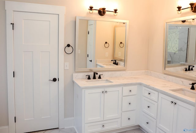 bathroom featuring dual vanity