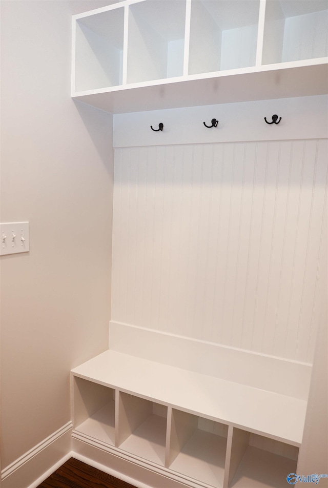 mudroom with dark hardwood / wood-style flooring