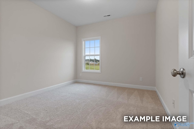 unfurnished room with carpet