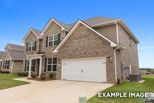 view of front of home featuring a garage, central air condition unit, and a front lawn