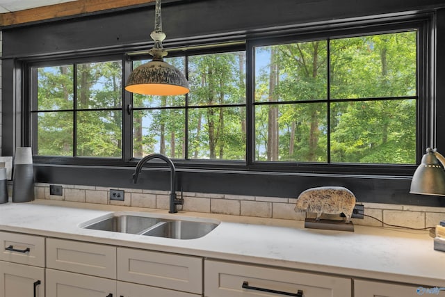 511 Pine Island Cir, Scottsboro, AL 35769 - kitchen featuring a sink and white cabinetry