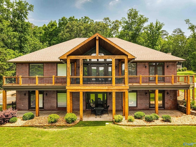 511 Pine Island Cir, Scottsboro, AL 35769 - rear view of property with a patio area, brick siding, and a yard