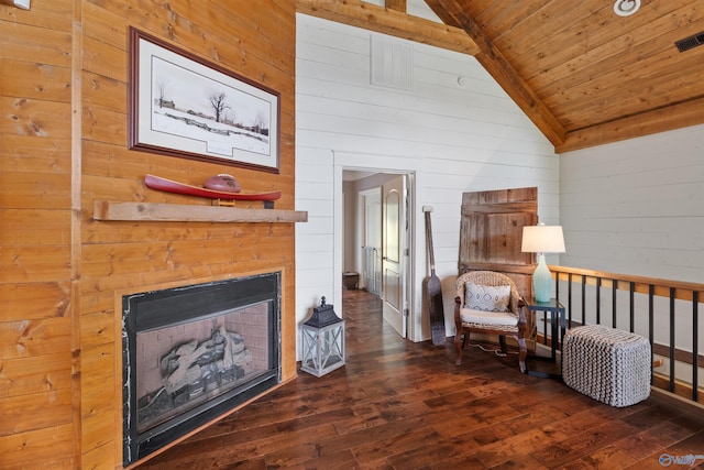 511 Pine Island Cir, Scottsboro, AL 35769 - living room featuring vaulted ceiling, wood ceiling, hardwood / wood-style floors, wooden walls, and a fireplace