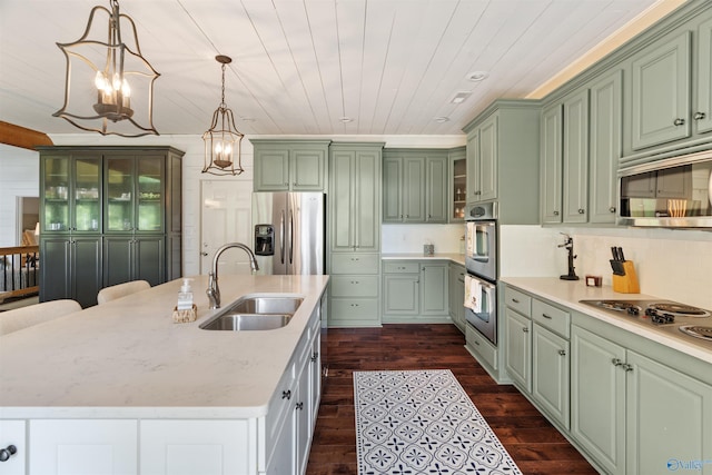 511 Pine Island Cir, Scottsboro, AL 35769 - kitchen featuring appliances with stainless steel finishes, a sink, green cabinetry, dark wood finished floors, and wood ceiling