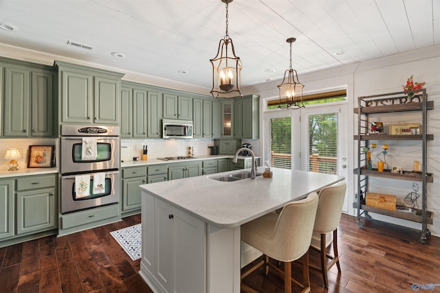 511 Pine Island Cir, Scottsboro, AL 35769 - kitchen featuring green cabinets, a sink, appliances with stainless steel finishes, dark wood-type flooring, and wood ceiling
