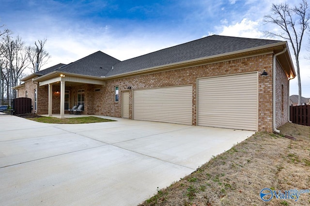 single story home featuring a garage