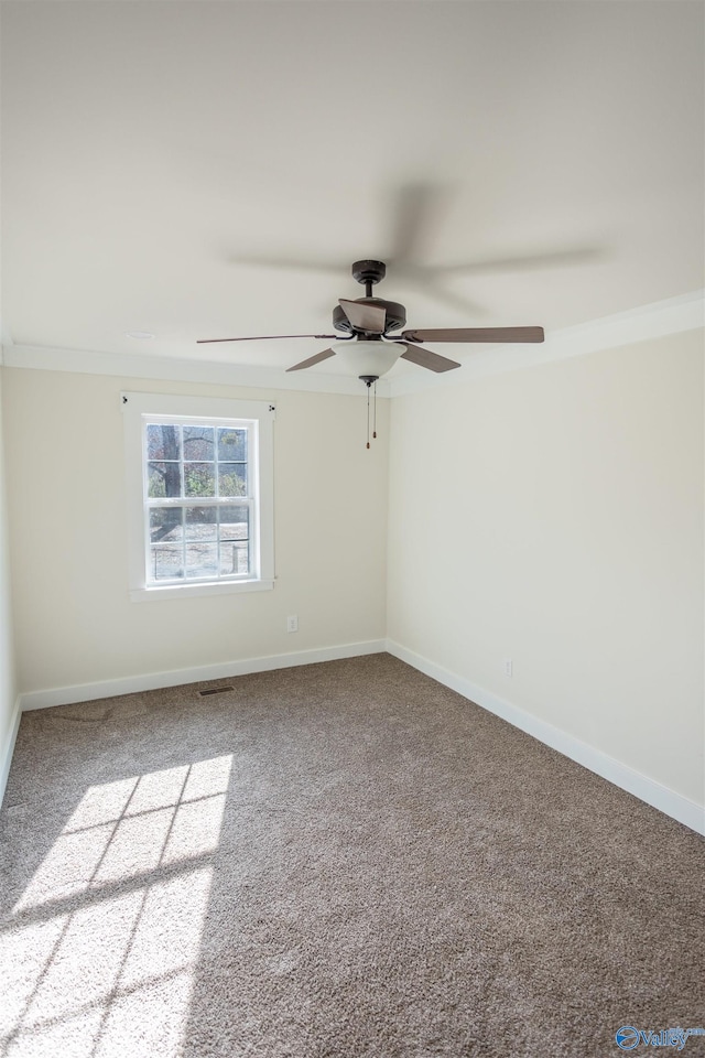 carpeted empty room with ceiling fan