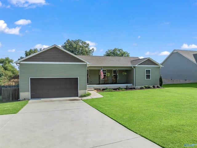 ranch-style home featuring a garage, a front lawn, and a porch