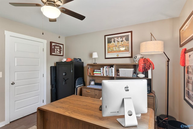 office with hardwood / wood-style flooring and ceiling fan