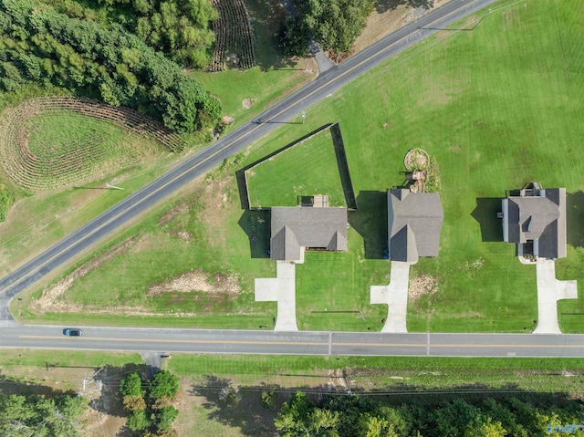 birds eye view of property featuring a rural view