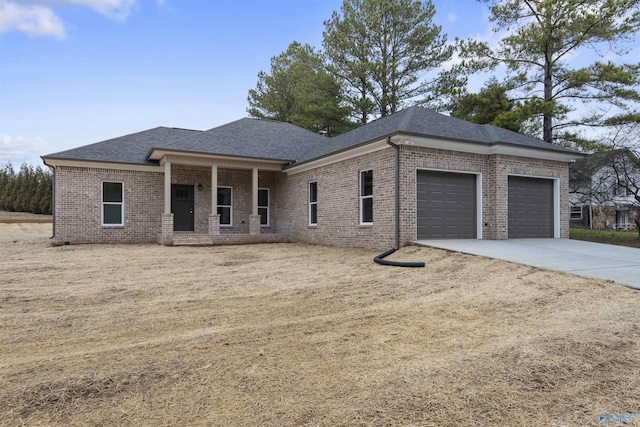 prairie-style house featuring a garage