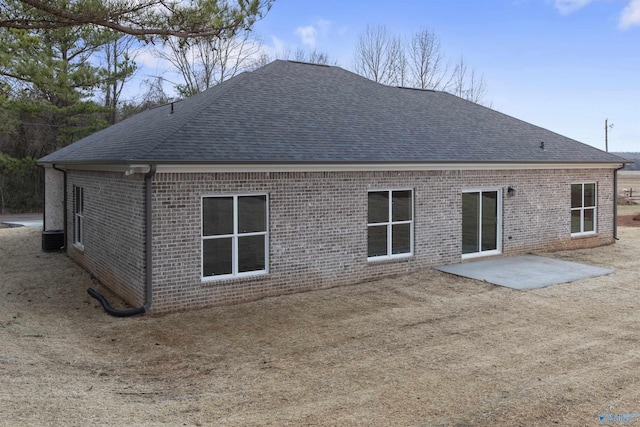 rear view of property featuring a patio