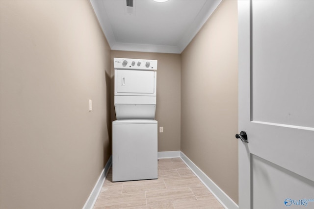 23784 Old Homeplace Way, Athens, AL 35613 - laundry room featuring stacked washer and clothes dryer and baseboards