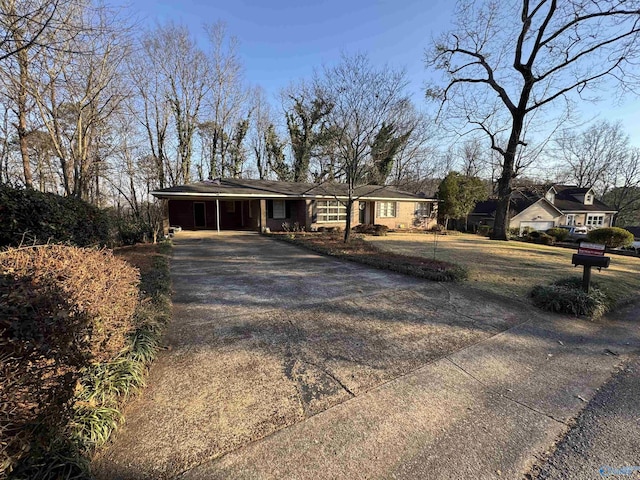 view of front of home featuring aphalt driveway