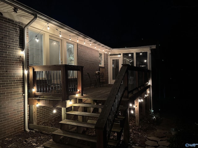 deck at night with stairway