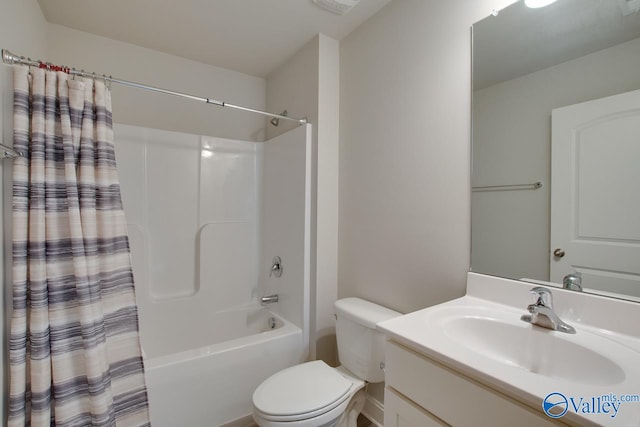 full bathroom featuring vanity, toilet, and shower / bathtub combination with curtain