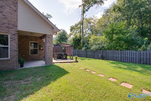 view of yard featuring a patio and a gazebo