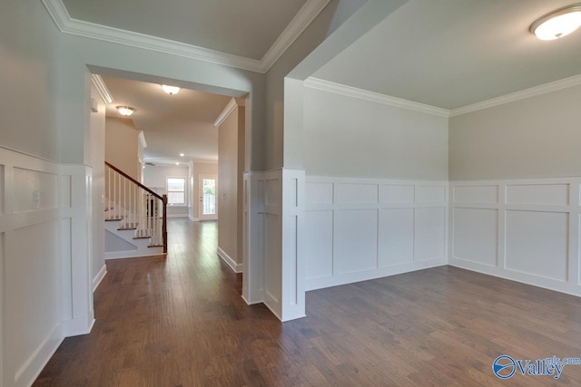 corridor with dark wood-type flooring and ornamental molding