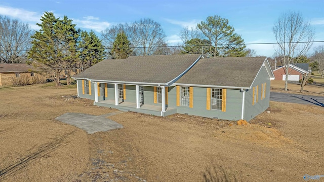 view of front of property with roof with shingles