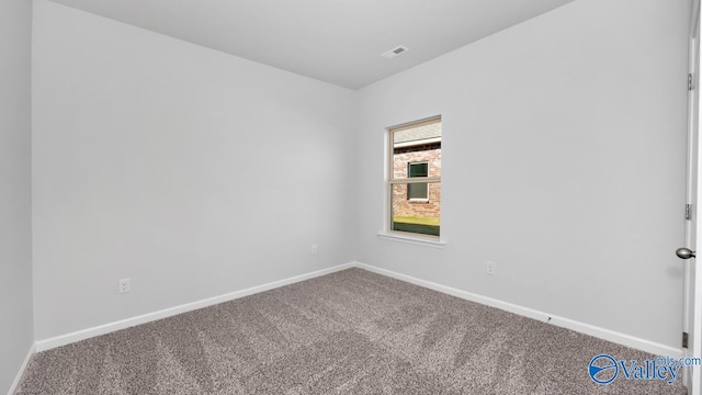 unfurnished room with carpet