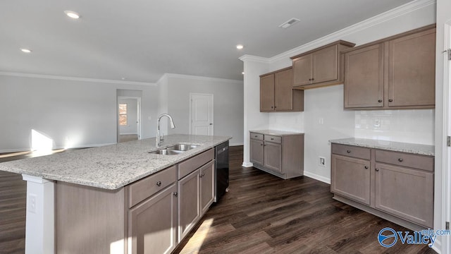 kitchen with ornamental molding, black dishwasher, dark hardwood / wood-style floors, sink, and an island with sink