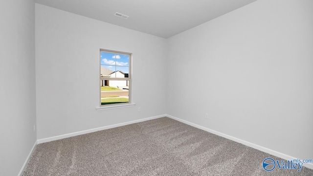 spare room with carpet flooring