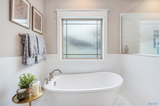 20009 Capitol Hill Dr, Tanner, AL 35671 - full bath featuring a soaking tub and a wainscoted wall
