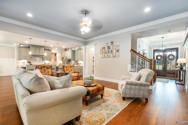 20009 Capitol Hill Dr, Tanner, AL 35671 - living room featuring dark wood finished floors, stairs, ceiling fan, ornamental molding, and baseboards