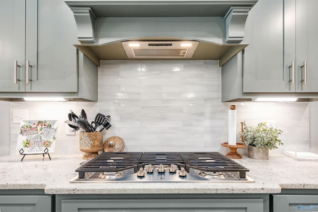 20009 Capitol Hill Dr, Tanner, AL 35671 - kitchen featuring decorative backsplash, stainless steel appliances, and gray cabinetry