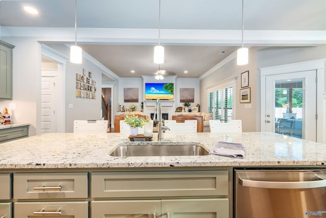 20009 Capitol Hill Dr, Tanner, AL 35671 - kitchen with dishwasher, a sink, open floor plan, light stone countertops, and pendant lighting