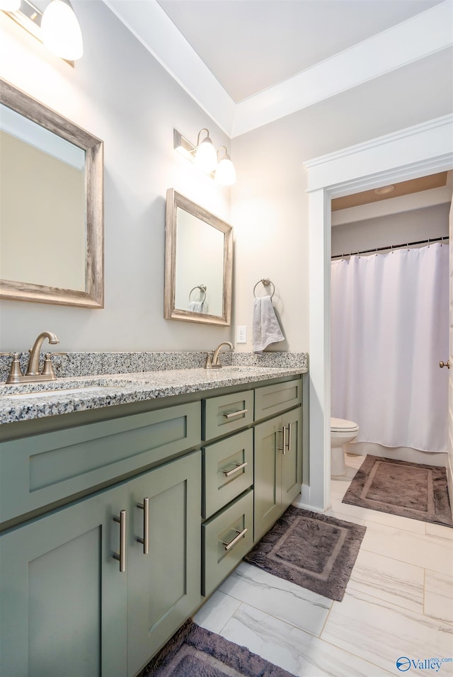 20009 Capitol Hill Dr, Tanner, AL 35671 - bathroom with double vanity, marble finish flooring, toilet, and a shower with curtain