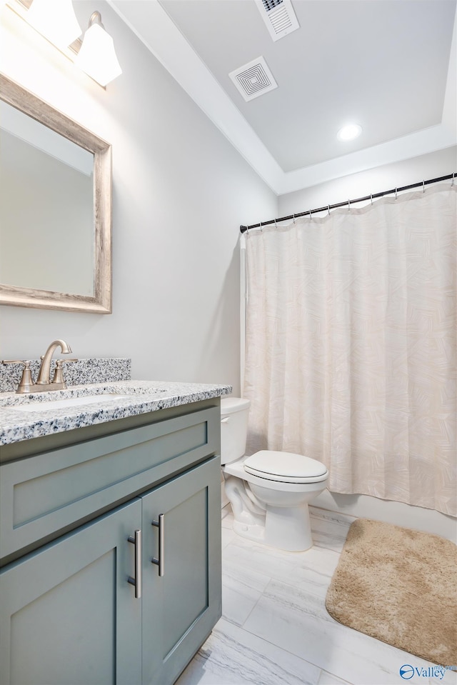 20009 Capitol Hill Dr, Tanner, AL 35671 - full bath featuring toilet, vanity, recessed lighting, and marble look tile flooring