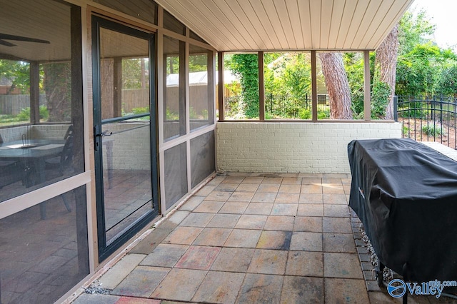 exterior space featuring vaulted ceiling and wooden ceiling