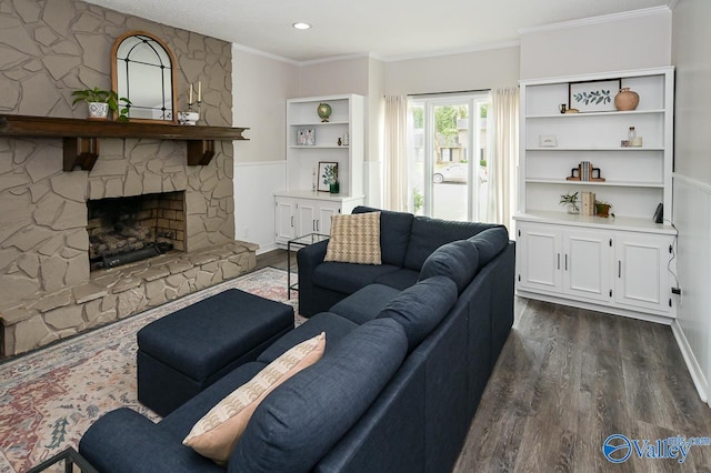 living room with a fireplace and dark wood-type flooring