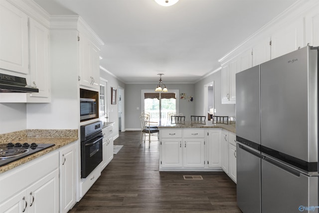 kitchen with white cabinets, black appliances, a peninsula, and ornamental molding