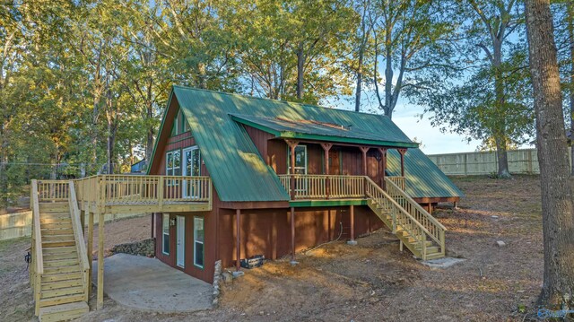 view of jungle gym featuring a wooden deck