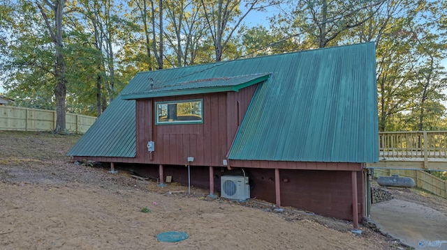 view of outdoor structure with ac unit