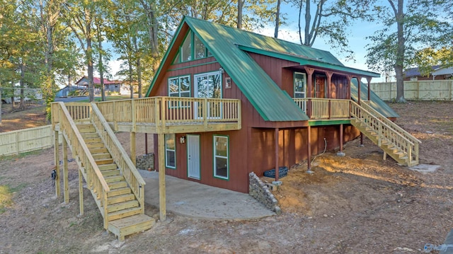 view of jungle gym featuring a patio area