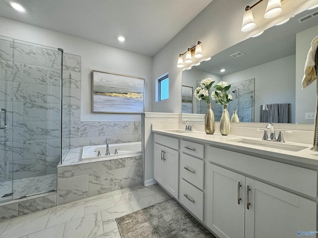 full bath with a marble finish shower, visible vents, marble finish floor, and a sink