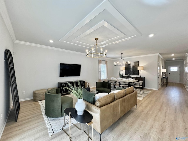 living area with light wood-style floors, baseboards, a wealth of natural light, and a chandelier