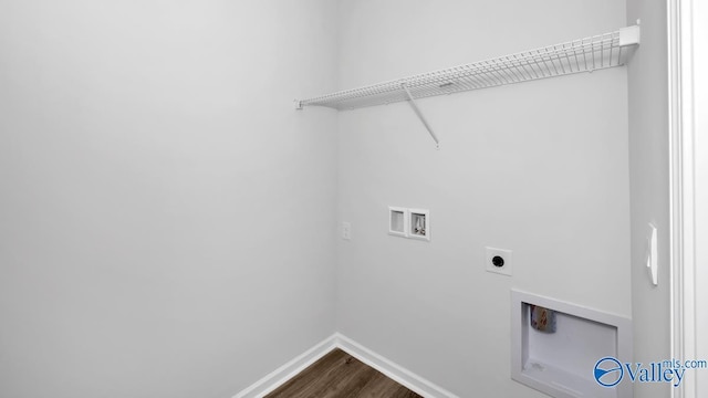 clothes washing area featuring hardwood / wood-style floors, washer hookup, and hookup for an electric dryer