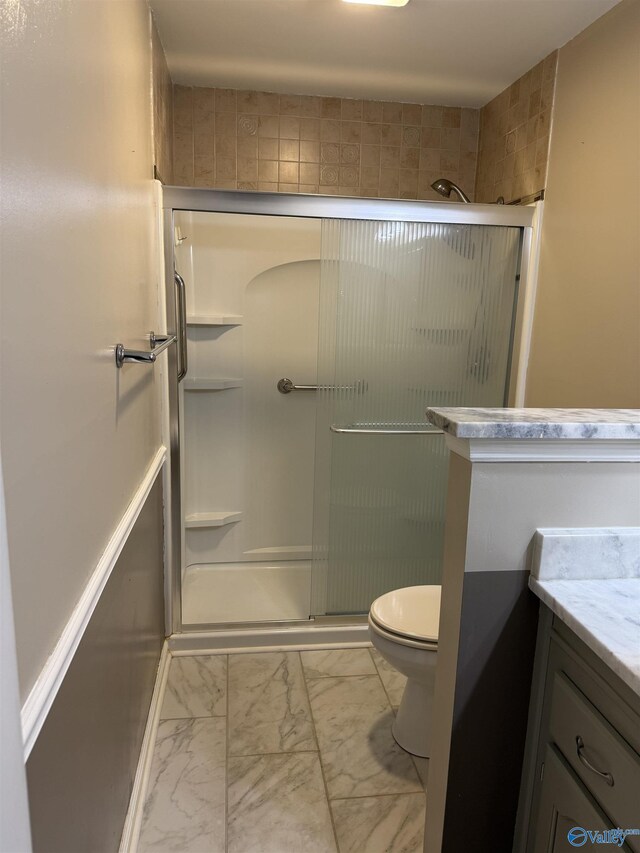 103 Katelyn Dr, Meridianville, AL 35759 - bathroom with marble finish floors, a stall shower, and vanity