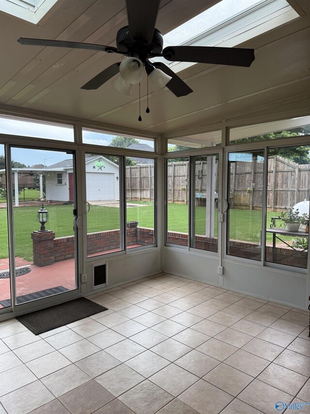 103 Katelyn Dr, Meridianville, AL 35759 - unfurnished sunroom featuring ceiling fan, plenty of natural light, and a skylight