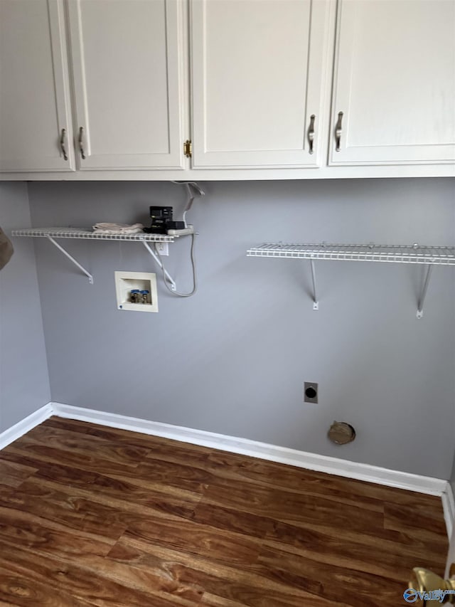 103 Katelyn Dr, Meridianville, AL 35759 - washroom featuring washer hookup, electric dryer hookup, dark wood-style flooring, and cabinet space